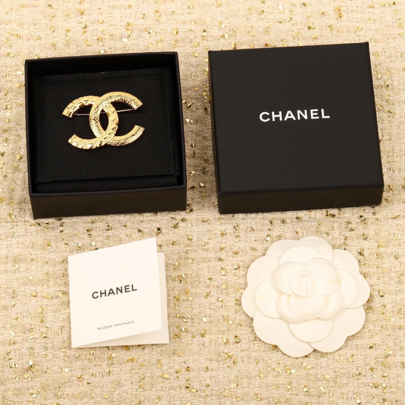 Ch**el brooches